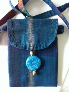 Hand woven fabric from Indonesia, hand stitched