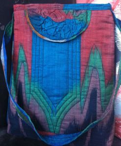 Hand woven Indonesian cotton fabric, crinkling technique for the tab, self lining plus Fast2Fuse interfacing and magnetic closures.