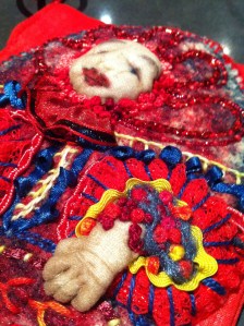 A close up of the person attached to the phone bag