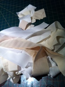 Strips of varying widths in different weights of silk and cotton fabric