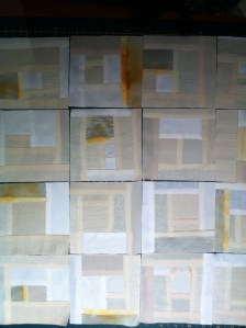 Sixteen log cabin blocks, randomly pieced