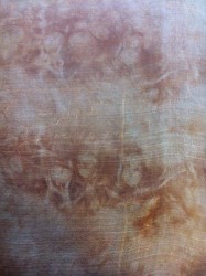 Silk wrapped tightly around small tea "balls" and boiled for 30 minutes in tea flower solution.