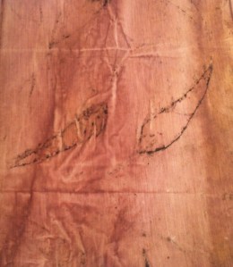 Fabric: 80% cotton ; 20% silk dyed in avocado pips , dried and washed, then pre-soaked in soda ash and wrapped around Euc. wandoo leaves/  Left under pressure for two weeks.