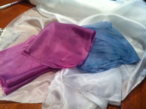 L-R: silk and purple carrot in water; water plus vinegar; and water plus soda ash respectively.