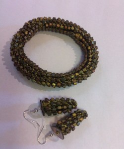 Pure silk yarn (two) with glass beads bracelet and earrings (silver plated fittings).
