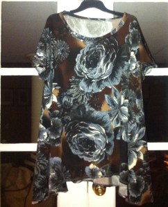 Lovely blue, white and brown knit fabric purchased at the Garage Sale at Fibreswest in October 2015.  Made into  a draped top in December 2015.